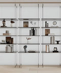 Sleek Black Four Tier Wall Mounted Storage Rack With Solid Aluminum Alloy Shelves For Living Room Decor displaying books and decor items.