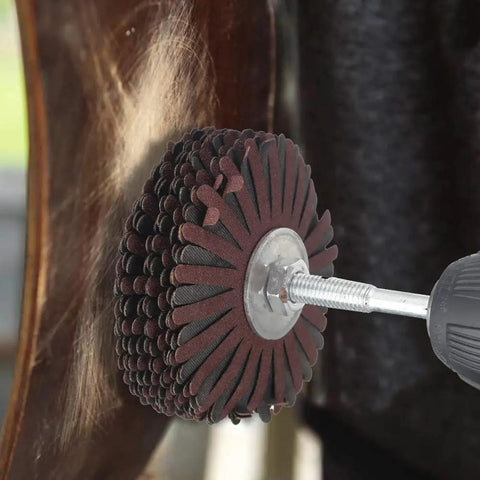 Close-up of Seven Pack Abrasive Cloth Flap Wheel With One Quarter Inch Shank 80mm Diameter For Woodworking Root Carving And Furniture Polishing Grits 80 120 150 180 240 320 400 in use on wood surface