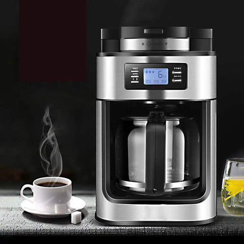 Legit Automatic Drip Coffee Maker With Built In Burr Grinder Smart Temp Control Programmable Timer with steaming coffee cup.