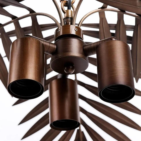 Close-up of Vintage Adjustable Tropical Coconut Leaves Chandelier Rustic Tree Lamps showing bronze finish and leaf details.