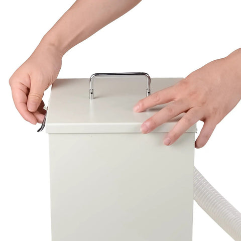 Hands opening the lid of a white Badass Lab Dust Collector 1000W vacuum, showing its easy maintenance feature.
