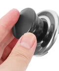 Upgrade Your Kitchen Game With This Heavy Duty Stainless Steel Whistling Kettle Lid Knob Replacement Kit. Super Loud Squeal Design For Easy Boiling Detection, Durable Build Quality That Lasts A Lifetime, And Simple Tool Free Install Perfect For Pro Chefs. black stainless steel whistling kettle lid knob replacement kit held in hand