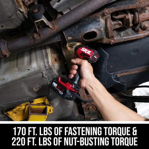 Person using the Power Core 20 Brushless 20V Three Eighths Inch Compact Impact Wrench Kit under a vehicle showing torque capability.