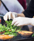 Top Notch Latex Disposable Gloves With Corn Starch Powdered Finish For Food Handling And Light Industrial Chores Smooth As Butter X Large used for preparing salad toppings.