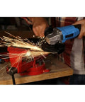 20V Lithium Ion Cordless Angle Grinder Built Like A Tank With An Adjustable Side Handle For Tough Cutting And Grinding Jobs Totally Wire Free So You Can Cruise Through Any Project Without Breaking A Sweat Or Dealing With Snags in action with sparks flying while cutting metal.
