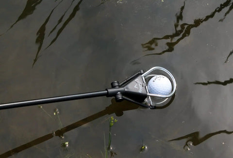 Golf Ball Retriever For Water, Telescopic 6 Feet Reach, Dual Zip Headcover, Lightweight Aluminum Grabber in use, grabbing ball from water