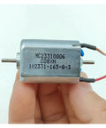 Pro Grade DC Motor With Dual 2mm Shafts And Carbon Brushes Delivering 24000Rpm High Speed Low Noise Operation With Rock Solid Cooling For Any Heavy Duty Weekend Build in hand.