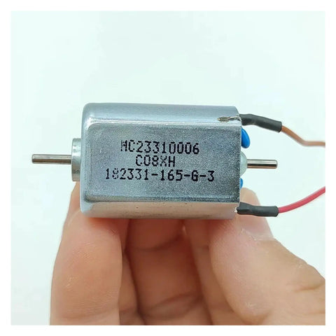 Pro Grade DC Motor With Dual 2mm Shafts And Carbon Brushes Delivering 24000Rpm High Speed Low Noise Operation With Rock Solid Cooling For Any Heavy Duty Weekend Build in hand.