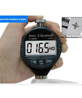 Digital Shore Hardness Durometer And Tester Meter For Rubber Leather Plastic Acrylic Portable Handheld Gauge Dead Nuts Accurate Pocket Powered Measurement Tool Black Edition being held, showing LCD display reading 16.5.