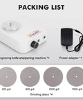 Solid Workhorse Rotary Engraver Sharpener With Four Precision Grinding Discs Variable Speed Dial, shown with discs and power adapter.