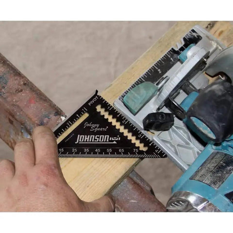 EZ Read 4.5 Inch Aluminum Carpenter Square With Glare-Resistant Finish on wood next to saw, CNC Machined For Durability, Black Finish