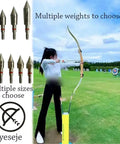Woman practicing archery with 100 Grain Archery Field Points Stainless Steel Tips 5/16 Inch O Ring Assembly 12 Pack for target practice
