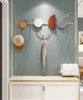 Premium Heavy Duty Wall Mounted Coat Hooks Sleek Wrought Iron Metal Rack for Entryway with hats and umbrella displayed.