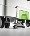Close-up of the Ct Midi I HEPA Bluetooth Dust Extractor wheels and stop button, highlighting compact mobile design for pros