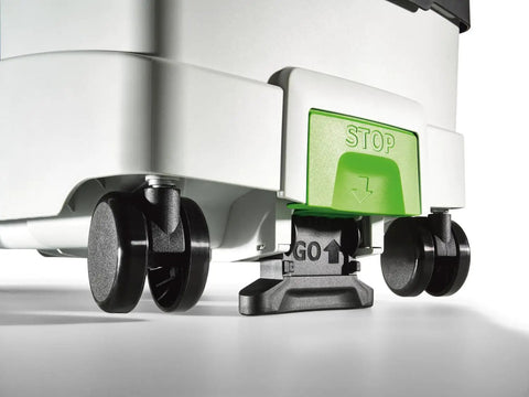 Close-up of the Ct Midi I HEPA Bluetooth Dust Extractor wheels and stop button, highlighting compact mobile design for pros