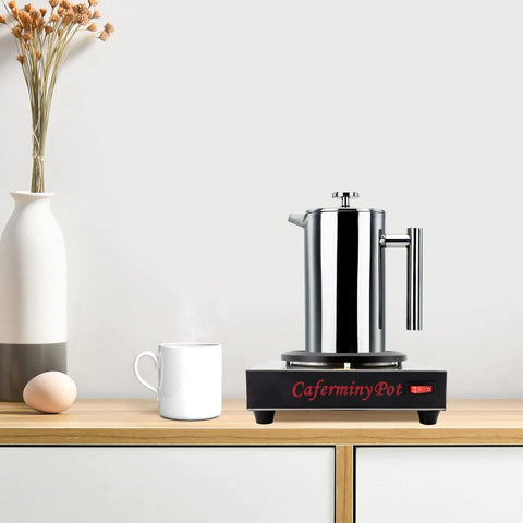 Professional Stainless Steel Coffee Warmer Plate, 80W Electric Mug Heater For Desk And Home on a wooden surface with a steaming mug.