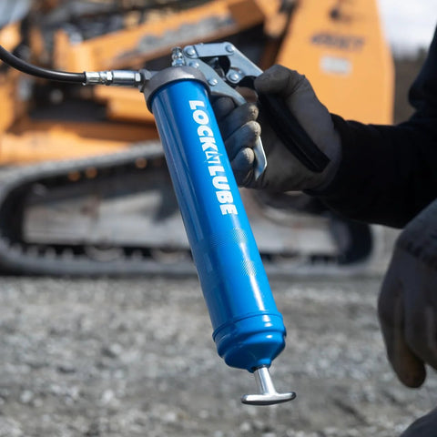 Heavy Duty Pistol Grip Grease Gun With Patented LockNLube Coupler Locks On And Does Not Leak, 20 Inch Hose shown in use outdoors