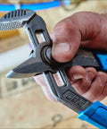 Hand holding SpeedGrip High Carbon Steel Tongue And Groove Pliers Set With Push Button Adjustment Lock and Safe Stop, close-up, USA made