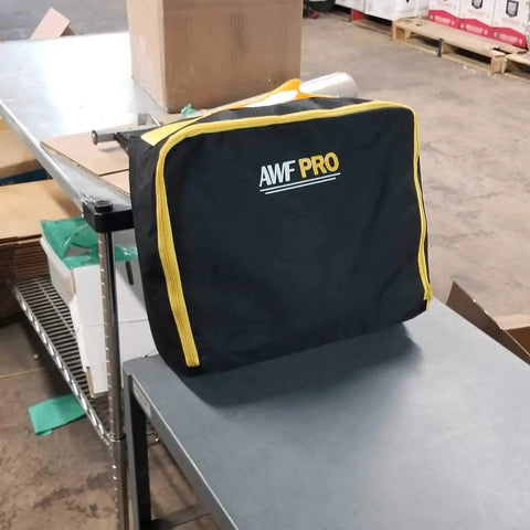 Heavy Duty Portable Spill Kit For Truckers Featuring A Real Deal 31 Piece Cleanup Set in rugged nylon bag on a table.