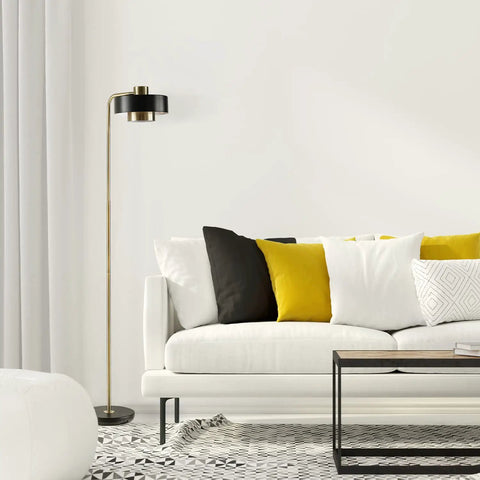 Felipe Floor Lamp With Tilting Head, Antique Brass Finish And Matte Black Accent in modern living room setting