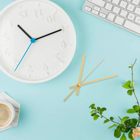 Metal Clock Hands Replacement Kit 10 Sets Handy DIY Wall Clock Hands gold set on blue background with coffee cup and keyboard