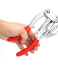 Hand holding Heavy Duty Handheld Hole Punch Kit For Sheet Metal And More, Boss Grade Hole Punch Set with red handles for versatile use