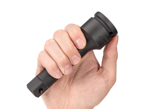 Hand holding 3/4 Inch Drive 6 Inch Impact Extension with Pin Detent, heavy duty socket tool for getting past obstructions
