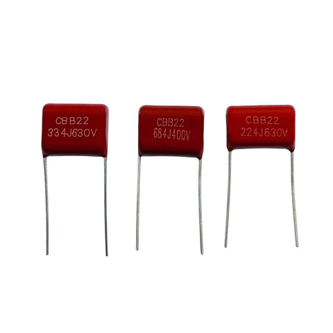 Must Have CBB22 Metallized Polypropylene Film Capacitor Kit, 400V And 630V, 25 Values, 250 Pieces, Assorted Capacitors From 0.001uF To 0.68uF, Red Inline 2 Pin, Tolerance Five Percent showing three capacitors with visible voltage ratings.