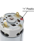 Close-up of RS550 DC Motor 8.2mm Gear 14 Teeth Micro Motor 21V 28000RPM High Speed Electric Saw Motor terminal with positive marking.
