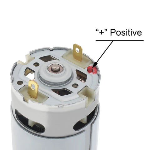 Close-up of RS550 DC Motor 8.2mm Gear 14 Teeth Micro Motor 21V 28000RPM High Speed Electric Saw Motor terminal with positive marking.