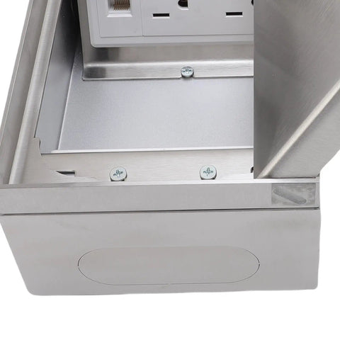 Built Tough Recessed Floor Power Outlet Kit Acting As A Smooth Operator For High Traffic Commercial Zones Kitchen Tables Flush Mount Electric Socket Silver Trim inside view with screws and stainless steel housing.