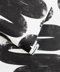 Removable Peel And Stick Black And White Wiggle Room Wallpaper For Easy Mess Free Self Adhesive Wall Covering No Residue Left Behind DIY Friendly Mid Century Modern Vibe Made In The USA 20.5-Inch By 16.5-Foot close-up of pattern