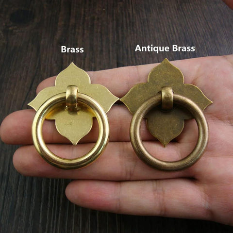 4 Pack Brass Drawer Pulls Antique Brass Cabinet Ring Handles With Mounting Screws 1.89 by 1.69 Inches shown on hand