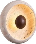 Round Travertine Wall Sconce with Stone Shade and Wood Accent E26 Hardwired Reading Light Fixture for Bedroom Bedside Living Room Hallway, beige stone with dark center.