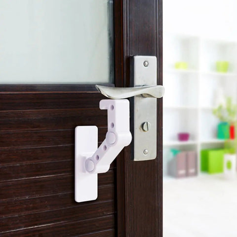 Kid Proof Cabinet And Appliance Door Lock In White Plastic With A Sturdy Lever That Latches Securely And Is Hard To Open shown on door