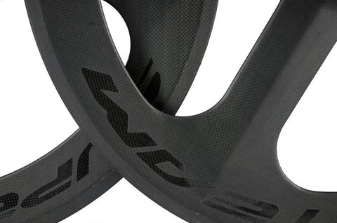 Close-up of Pro Grade Carbon Clincher Wheelset With 70mm Deep 23mm Wide Tri Spoke Design For Road Bikes Matte Finish 700C