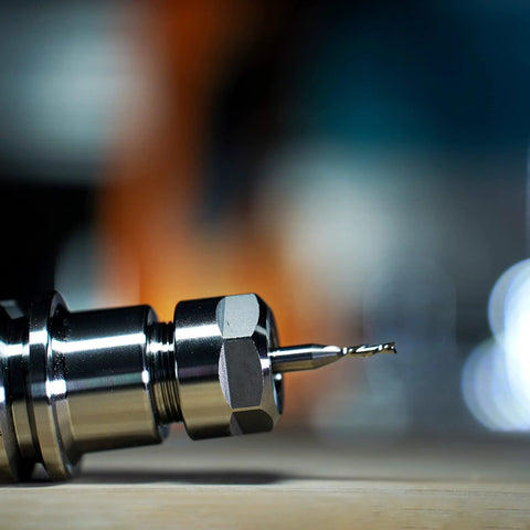 SpeTool carbide down-cut spiral router bit, 1/4" shank and 1/8" cutting diameter, close-up view