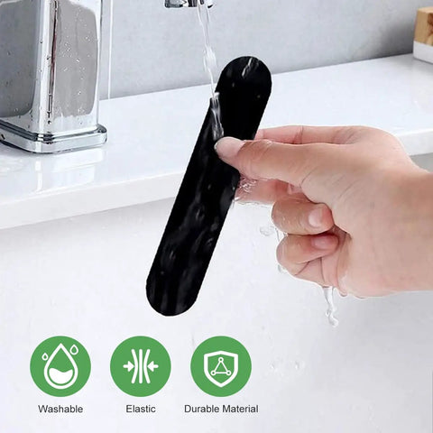 Person washing 12 Pcs Grippers For Hardwood Floors under running water, showcasing washable, elastic, and durable features.