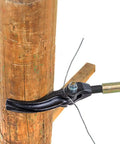 Heavy Duty Fence Wire Tightener Tool Barbed Wire Tensioner for garden and farm fences installed around a wooden post.
