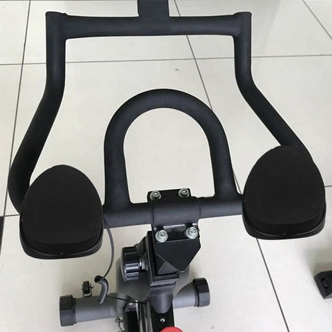 Comfy Armrest Pads For Indoor Cycling Bikes, EVA cushioning on exercise bike handles, ergonomic design for hand support.