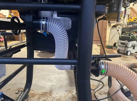 Clear 1-1/2 Inch By 10 Foot Dust Collection Hose with Carbon Steel Wire for Dust Collectors in woodworking setup.