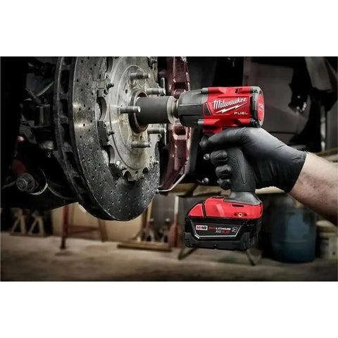 M18 FUEL 1/2 Inch Hi Torque And 3/8 Inch MTIW Automotive Combo Kit Red 3010-22 in use for garage mechanic brake work