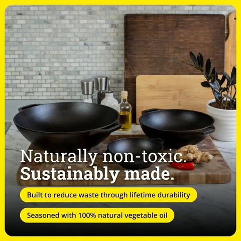 Mini Cast Iron Wok For Stir Fry Lovers With Naturally Seasoned Finish and Dual Loop Handles displayed on a kitchen counter.
