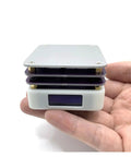 Hand holding 65W Mini Hot Plate Soldering Station for SMD Rework and Desoldering, Compact PCB Preheater Plate, aluminum material