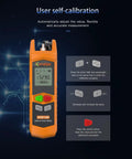Front view of orange Komshine KPM-11M optical power meter handheld tester with LCD display and colored control buttons.