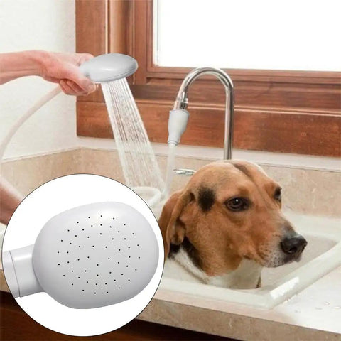 Portable Shampoo Sprayer For Round Faucets With Rubber Hose used for pet grooming in sink, detailed nozzle view.
