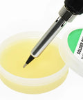 Soldering iron tip dipping into Pro Grade Soldering Paste And Cream For Electronics Repairs PCB And LED Soldering Easy To Use Welding Cream