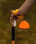 Hand holding orange waterproof portable 2-In-1 Camping Light And Tent Lantern For Outdoor Adventures