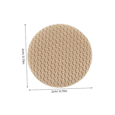 Close-up of a beige button with texture from Car Headliner Repair Kit With 60 Pieces Headliner Buttons And Durable Rivets For Sagging Roof Liner Quick Installation DIY Auto Interior Fix Universal Fit Professional Style Finish.