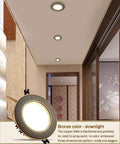 Premium Heavy Duty Copper Finish 5 Pack Recessed LED Downlights Featuring Smooth Baffle Trim and No Hassle Retrofit Install Adjustable Warm To Cool White 12 Watt Dimmable ceiling lamps in stylish bronze decor.